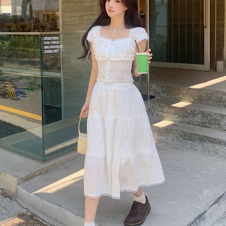A collection of Dongdaemum Women’s Dresses, encapsulating the charm of Korean fashion.