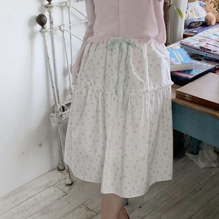 A collection of Dongdaemum Women’s Dresses, encapsulating the charm of Korean fashion.