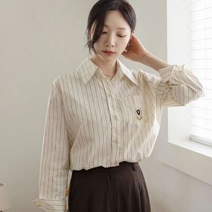 A selection of Dongdaemum Women’s Shirts & Tops, showcasing the best of Korean fashion.