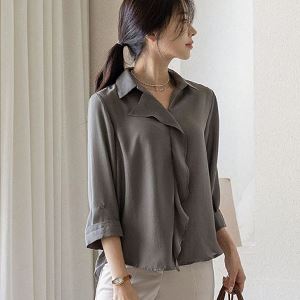 A selection of Dongdaemum Women’s Shirts & Tops, showcasing the best of Korean fashion.