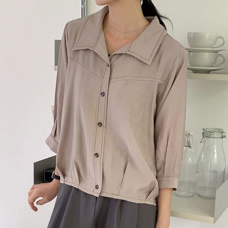 A selection of Dongdaemum Women’s Shirts & Tops, showcasing the best of Korean fashion.