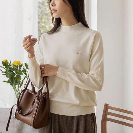 A selection of Dongdaemum Women’s Shirts & Tops, showcasing the best of Korean fashion.