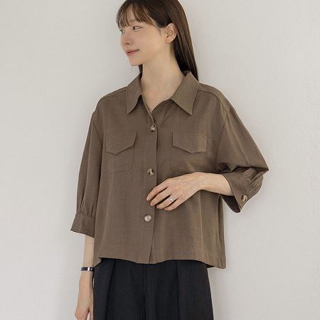 A selection of Dongdaemum Women’s Shirts & Tops, showcasing the best of Korean fashion.