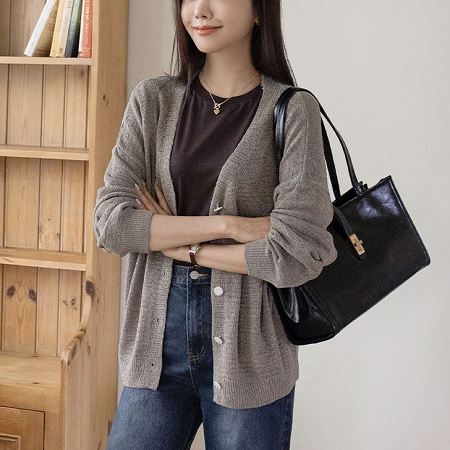 A variety of Dongdaemum Women’s Coats & Jackets, reflecting the sophistication of Korean fashion.