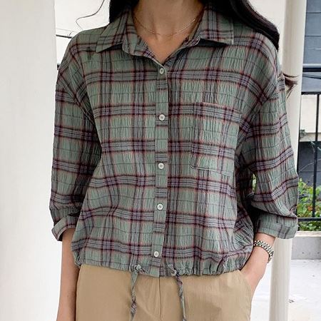 A selection of Dongdaemum Women’s Shirts & Tops, showcasing the best of Korean fashion.