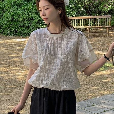 A selection of Dongdaemum Women’s Shirts & Tops, showcasing the best of Korean fashion.