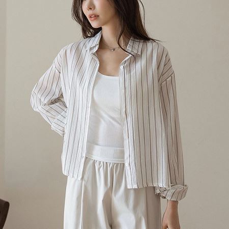 A selection of Dongdaemum Women’s Shirts & Tops, showcasing the best of Korean fashion.