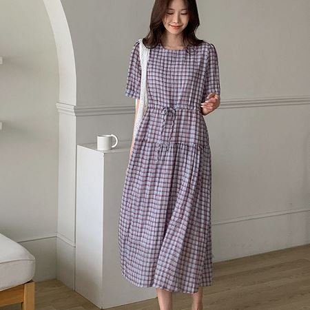 A collection of Dongdaemum Women’s Dresses, encapsulating the charm of Korean fashion.