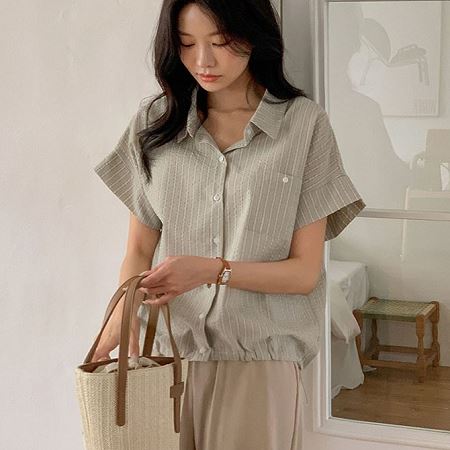 A selection of Dongdaemum Women’s Shirts & Tops, showcasing the best of Korean fashion.