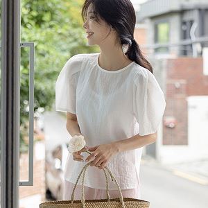 A selection of Dongdaemum Women’s Shirts & Tops, showcasing the best of Korean fashion.