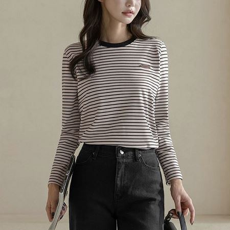 A selection of Dongdaemum Women’s Shirts & Tops, showcasing the best of Korean fashion.