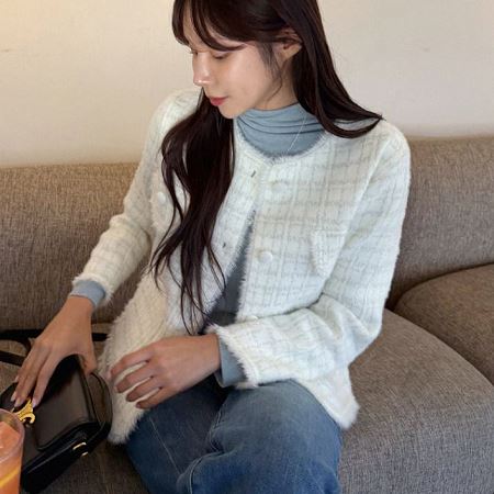 A variety of Dongdaemum Women’s Coats & Jackets, reflecting the sophistication of Korean fashion.