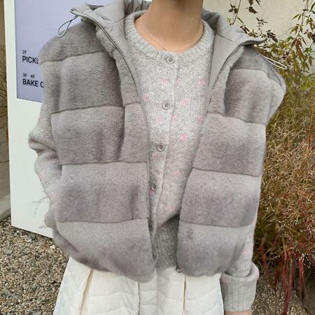 A variety of Dongdaemum Women’s Coats & Jackets, reflecting the sophistication of Korean fashion.