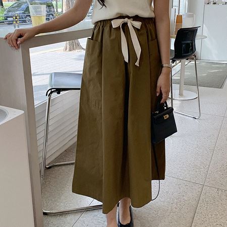 A collection of Dongdaemum Women’s Dresses, encapsulating the charm of Korean fashion.