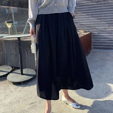 A collection of Dongdaemum Women’s Dresses, encapsulating the charm of Korean fashion.