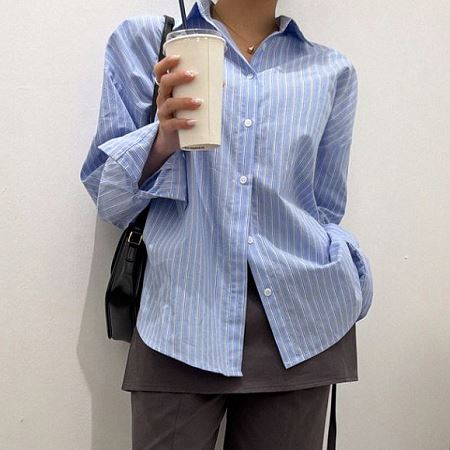 A selection of Dongdaemum Women’s Shirts & Tops, showcasing the best of Korean fashion.