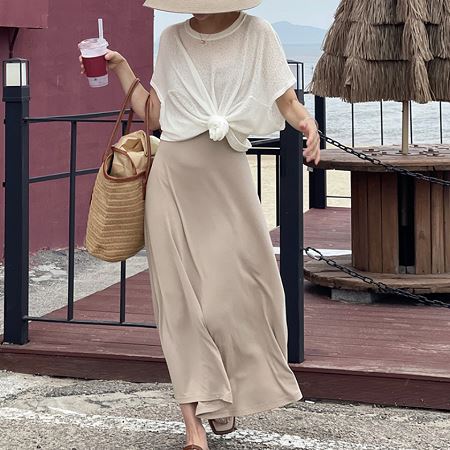 A variety of Dongdaemum Women’s One-Pieces, representing the allure of Korean fashion.