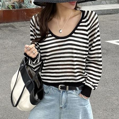 A selection of Dongdaemum Women’s Shirts & Tops, showcasing the best of Korean fashion.