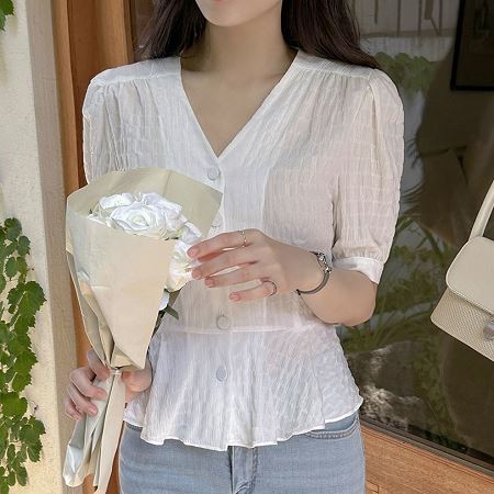 A selection of Dongdaemum Women’s Shirts & Tops, showcasing the best of Korean fashion.