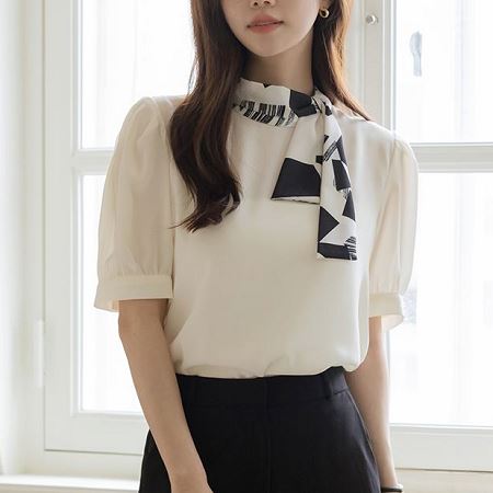 Dongdaemum Women’s Shirts, Tops & T-Shirts, a testament to the elegance and quality of wholesale Korean fashion.