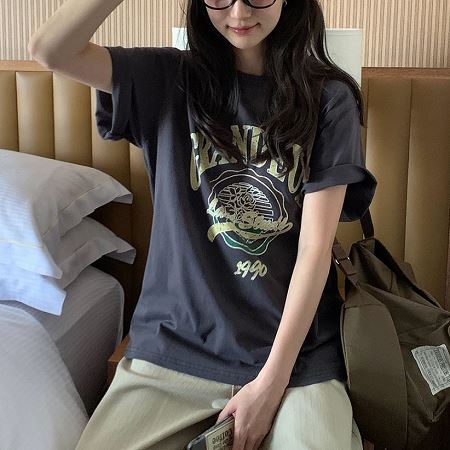 A selection of Dongdaemum Women’s Shirts & Tops, showcasing the best of Korean fashion.