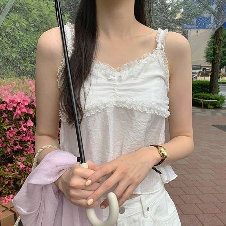A selection of Dongdaemum Women’s Shirts & Tops, showcasing the best of Korean fashion.