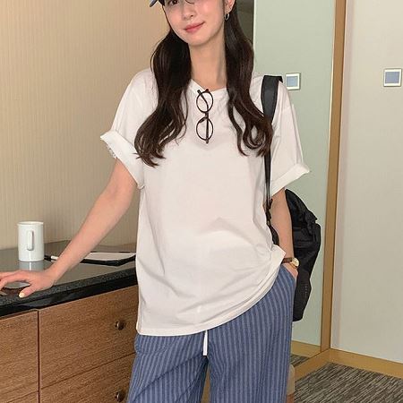 A selection of Dongdaemum Women’s Shirts & Tops, showcasing the best of Korean fashion.