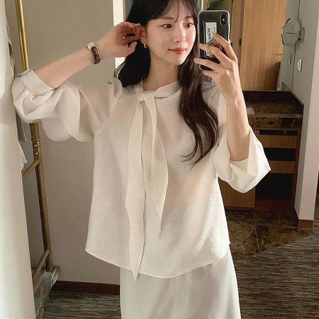 A selection of Dongdaemum Women’s Shirts & Tops, showcasing the best of Korean fashion.