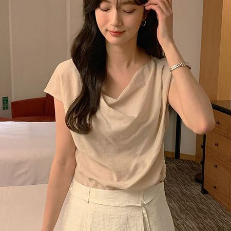 A selection of Dongdaemum Women’s Shirts & Tops, showcasing the best of Korean fashion.