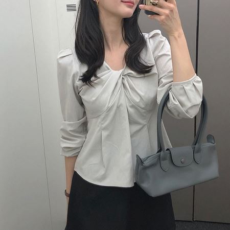 A selection of Dongdaemum Women’s Shirts & Tops, showcasing the best of Korean fashion.