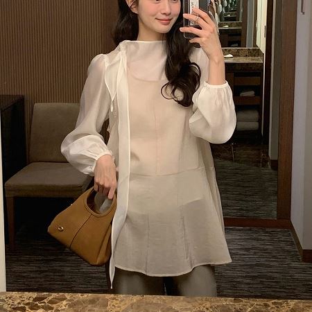 A collection of Dongdaemum Women’s Dresses, encapsulating the charm of Korean fashion.