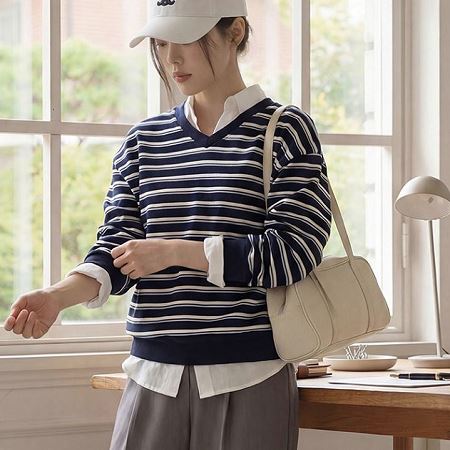 A selection of Dongdaemum Women’s Shirts & Tops, showcasing the best of Korean fashion.