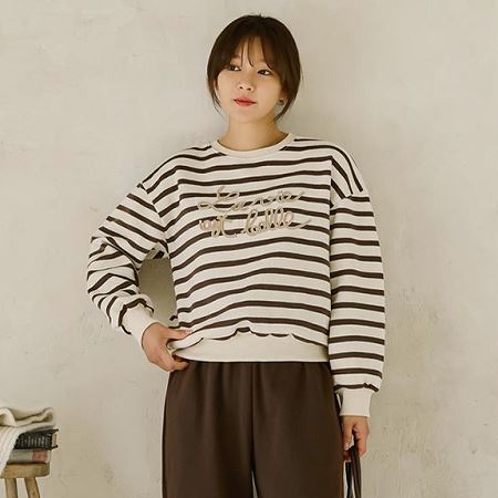 A selection of Dongdaemum Women’s Shirts & Tops, showcasing the best of Korean fashion.