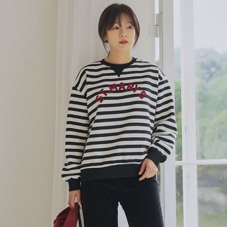A selection of Dongdaemum Women’s Shirts & Tops, showcasing the best of Korean fashion.