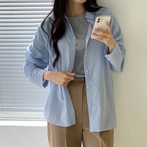 Dongdaemum Women’s Shirts, Tops & T-Shirts, a testament to the elegance and quality of wholesale Korean fashion.