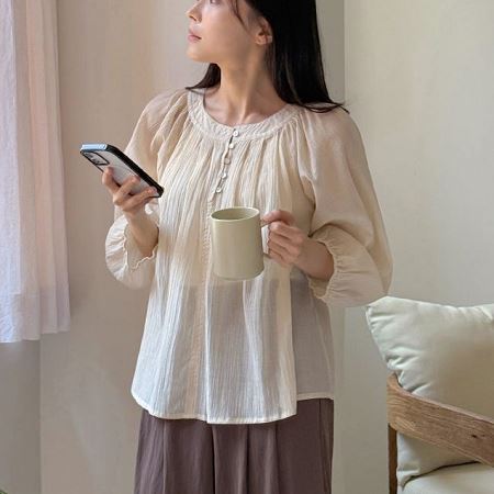 A selection of Dongdaemum Women’s Shirts & Tops, showcasing the best of Korean fashion.