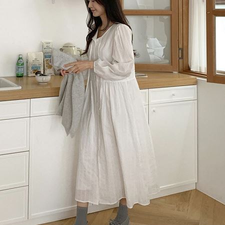 A collection of Dongdaemum Women’s Dresses, encapsulating the charm of Korean fashion.