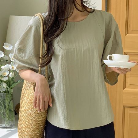 A selection of Dongdaemum Women’s Shirts & Tops, showcasing the best of Korean fashion.