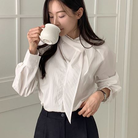 A selection of Dongdaemum Women’s Shirts & Tops, showcasing the best of Korean fashion.