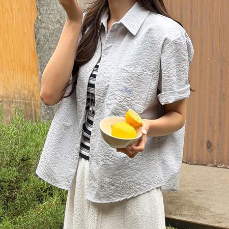 A selection of Dongdaemum Women’s Shirts & Tops, showcasing the best of Korean fashion.