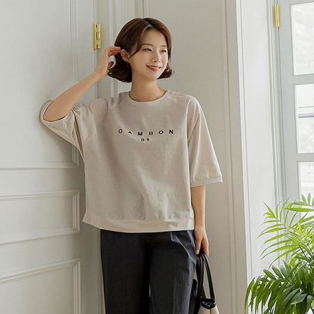 A selection of Dongdaemum Women’s Shirts & Tops, showcasing the best of Korean fashion.