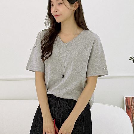 A selection of Dongdaemum Women’s Shirts & Tops, showcasing the best of Korean fashion.