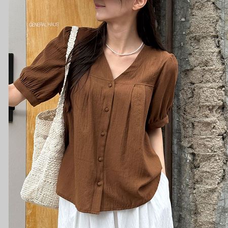A selection of Dongdaemum Women’s Shirts & Tops, showcasing the best of Korean fashion.