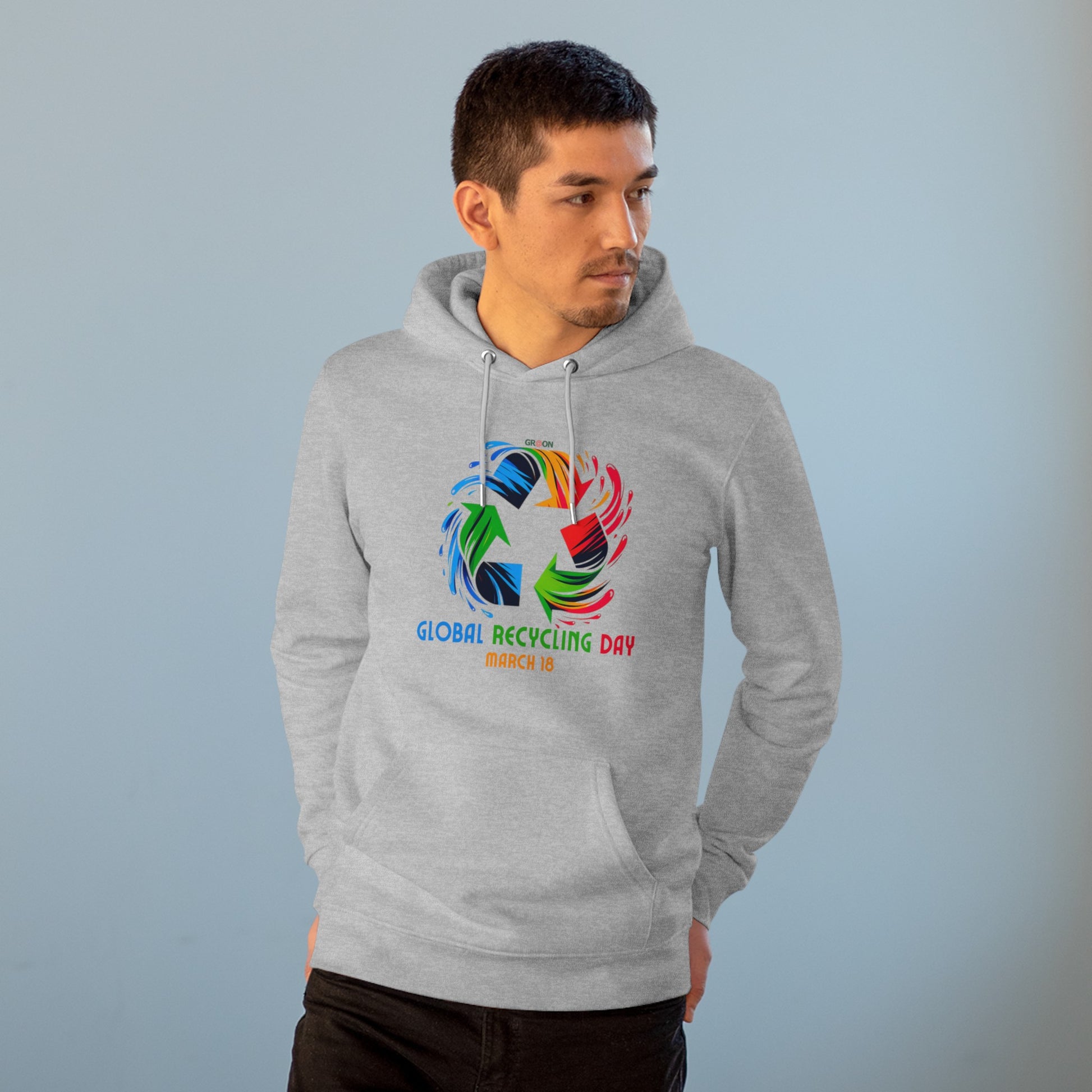 Global Recycling Day, Model wearing a GR@ON Hoodie made from organic cotton, featuring a stylish and sustainable design. GR@ON Hoodies: Sustainable warmth, stylish comfort.