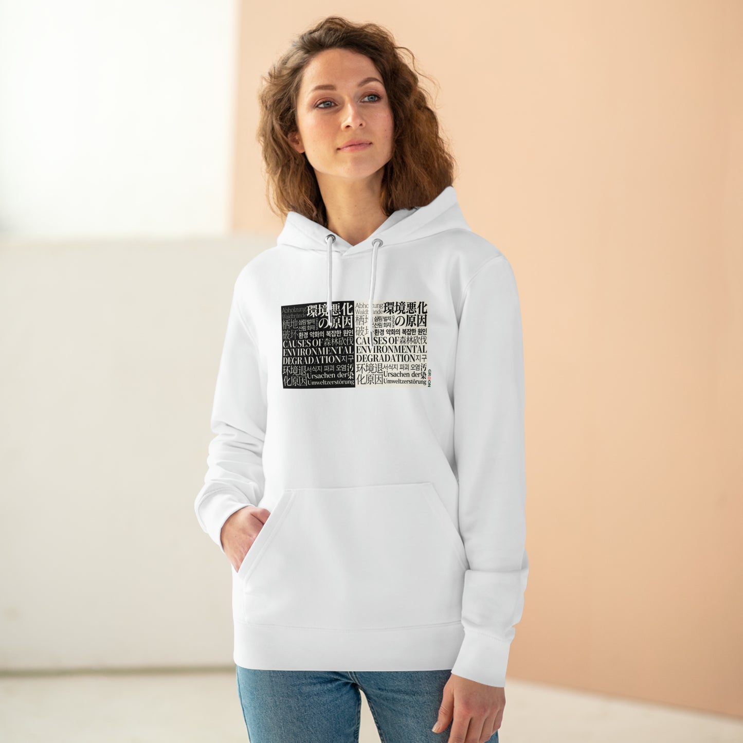 Model wearing a GR@ON Hoodie made from organic cotton, featuring a stylish and sustainable design. GR@ON Hoodies: Sustainable warmth, stylish comfort.