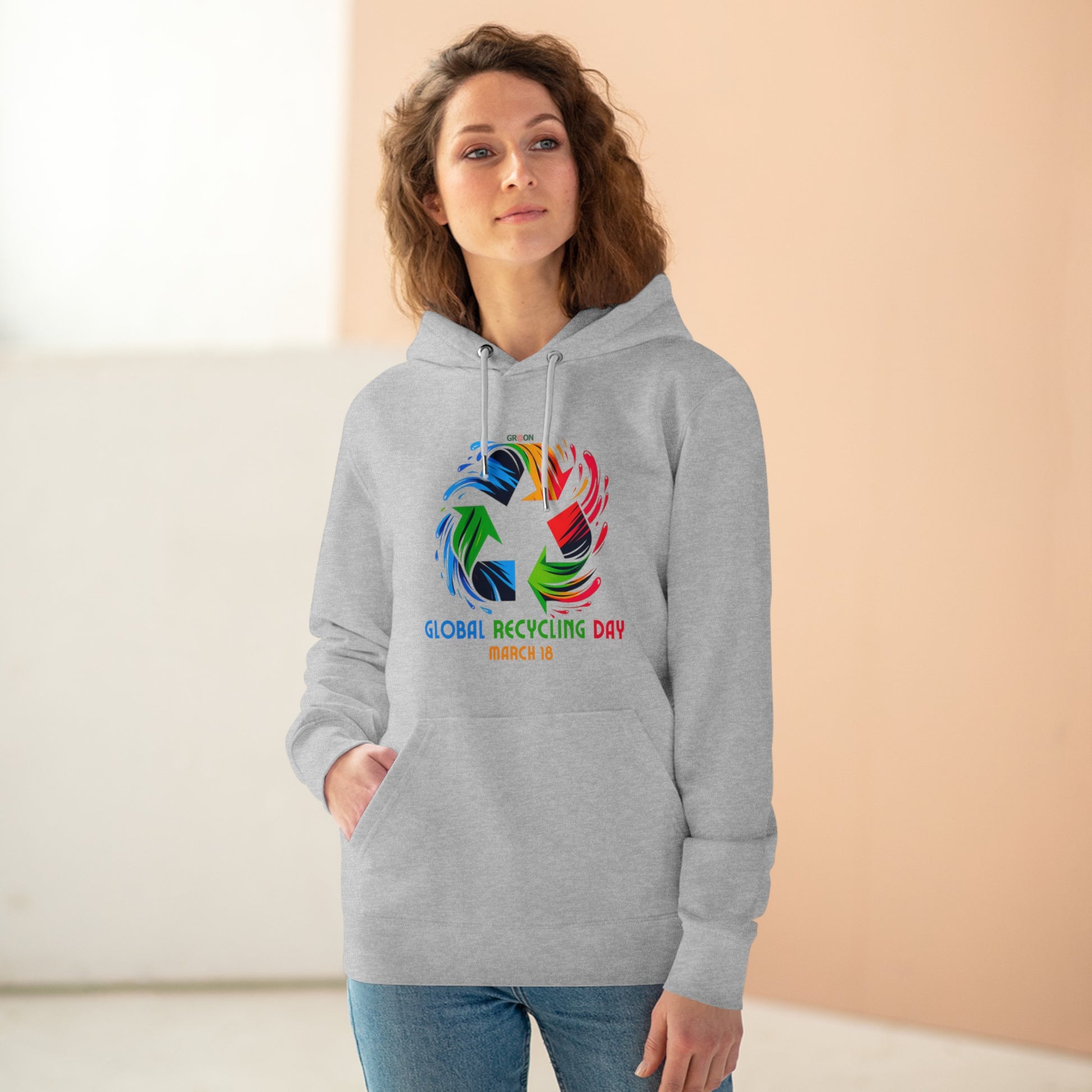 Global Recycling Day, Model wearing a GR@ON Hoodie made from organic cotton, featuring a stylish and sustainable design. GR@ON Hoodies: Sustainable warmth, stylish comfort.