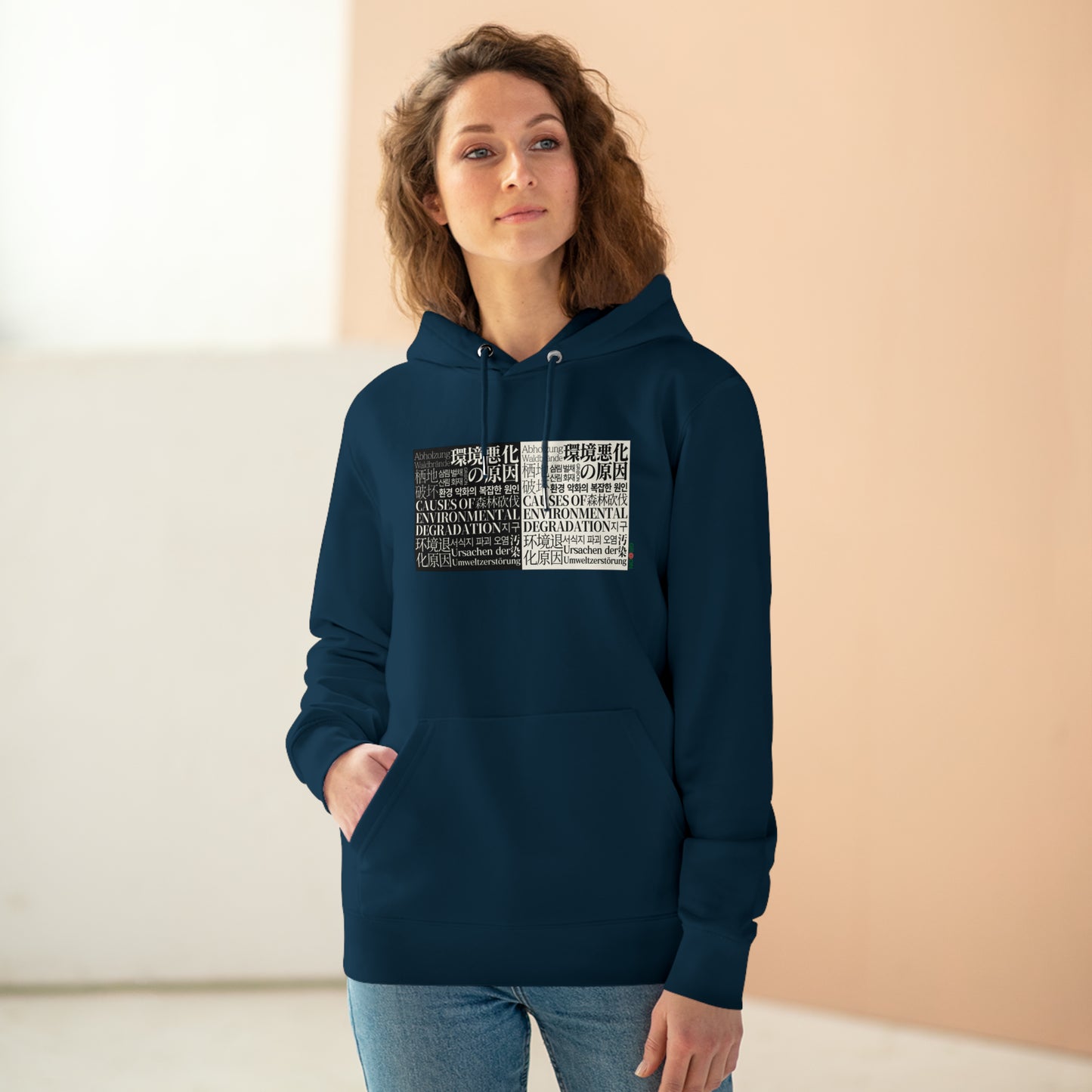 Model wearing a GR@ON Hoodie made from organic cotton, featuring a stylish and sustainable design. GR@ON Hoodies: Sustainable warmth, stylish comfort.