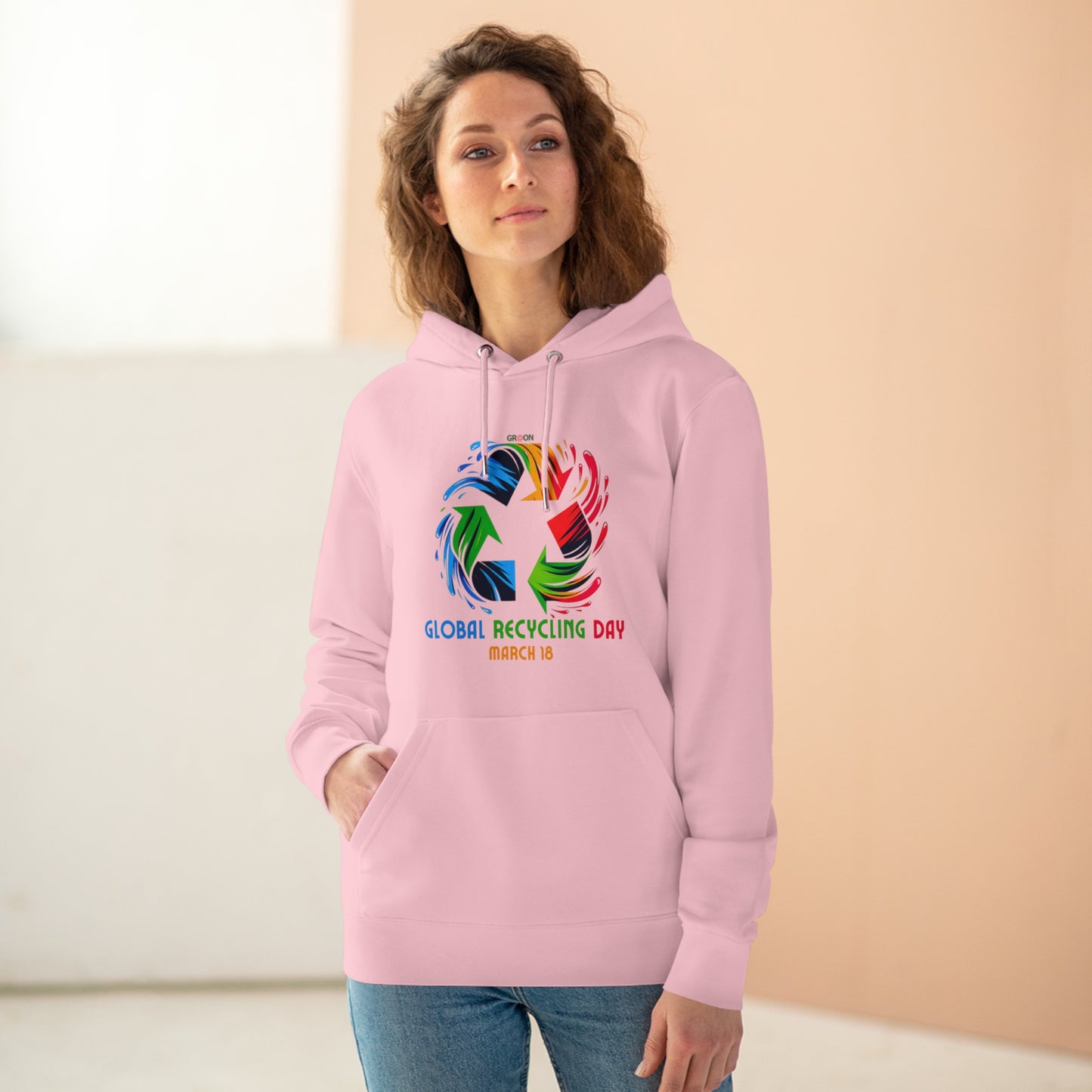 Global Recycling Day, Model wearing a GR@ON Hoodie made from organic cotton, featuring a stylish and sustainable design. GR@ON Hoodies: Sustainable warmth, stylish comfort.