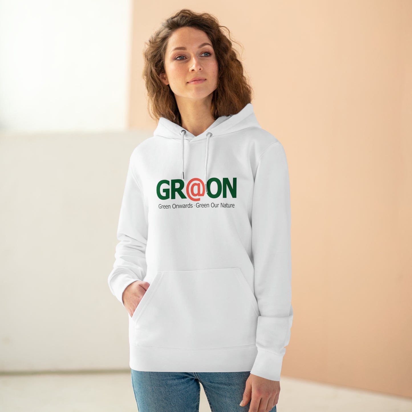 Model wearing a GR@ON Hoodie made from organic cotton, featuring a stylish and sustainable design. GR@ON Hoodies: Sustainable warmth, stylish comfort.