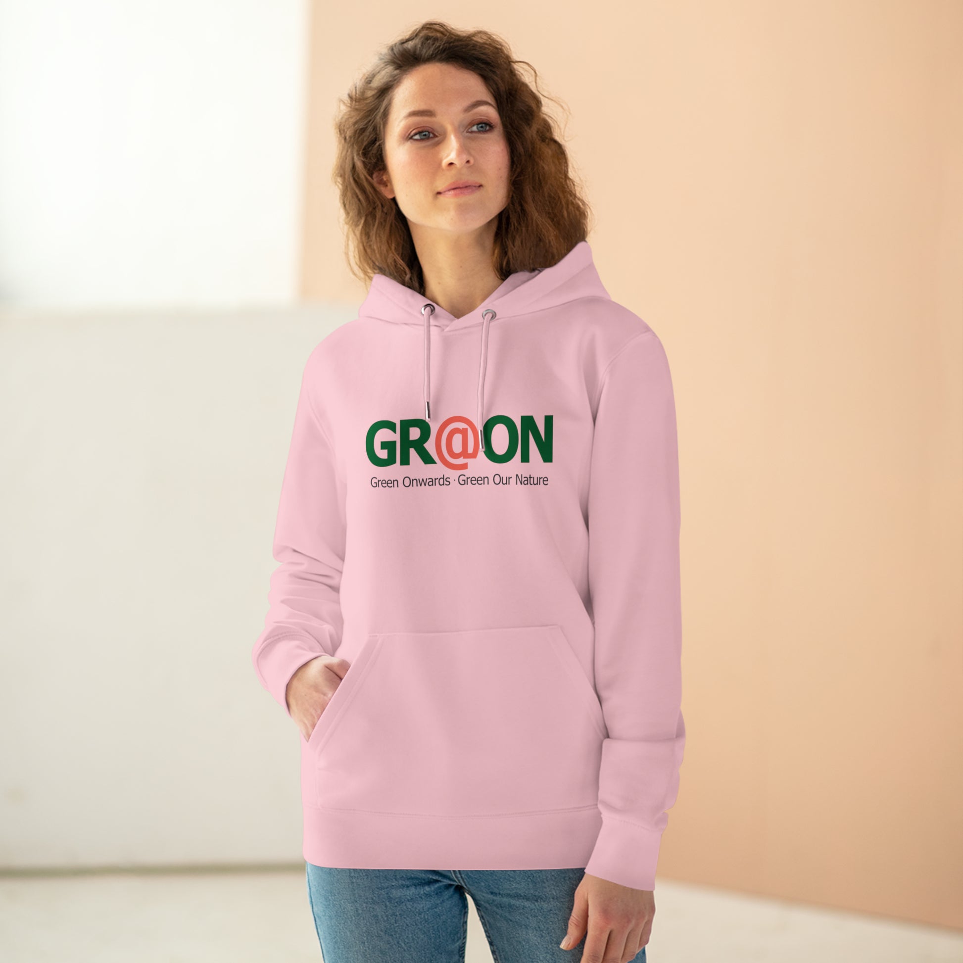 Model wearing a GR@ON Hoodie made from organic cotton, featuring a stylish and sustainable design. GR@ON Hoodies: Sustainable warmth, stylish comfort.